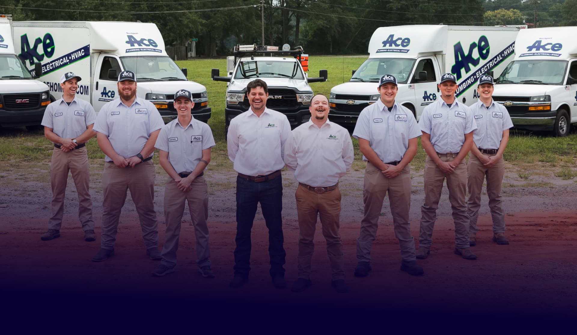 Ace Plumbing, Electric, Heating & Air technicians with branded service trucks in Greenville, SC